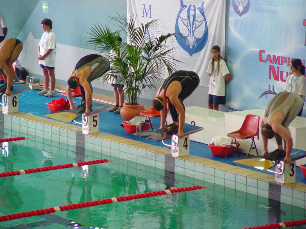 06-59  2006 г.  На 4 дорожке старт принимает Е.Скорженко. 13-й чемпионат мира. Турин, Италия
