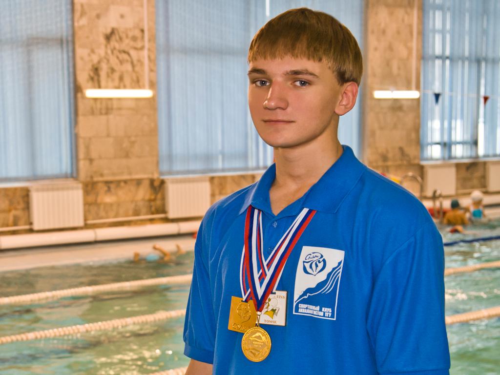 12-4    2012 г.  С.Доценко в бассейне ТГУ.